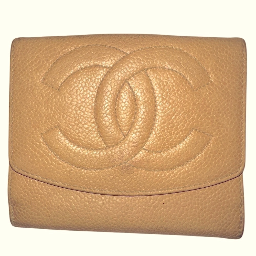 Authentic Chanel beige caviar wallet.